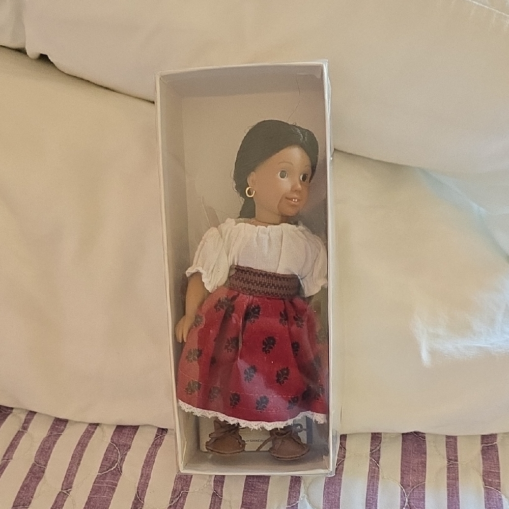 Doll with Red Skirt and White Blouse